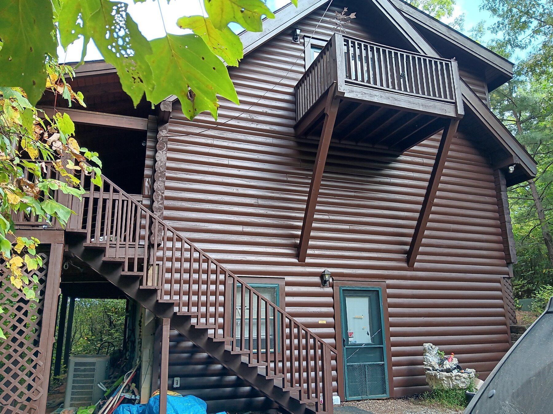 Log cabin exterior pressure-washed clean